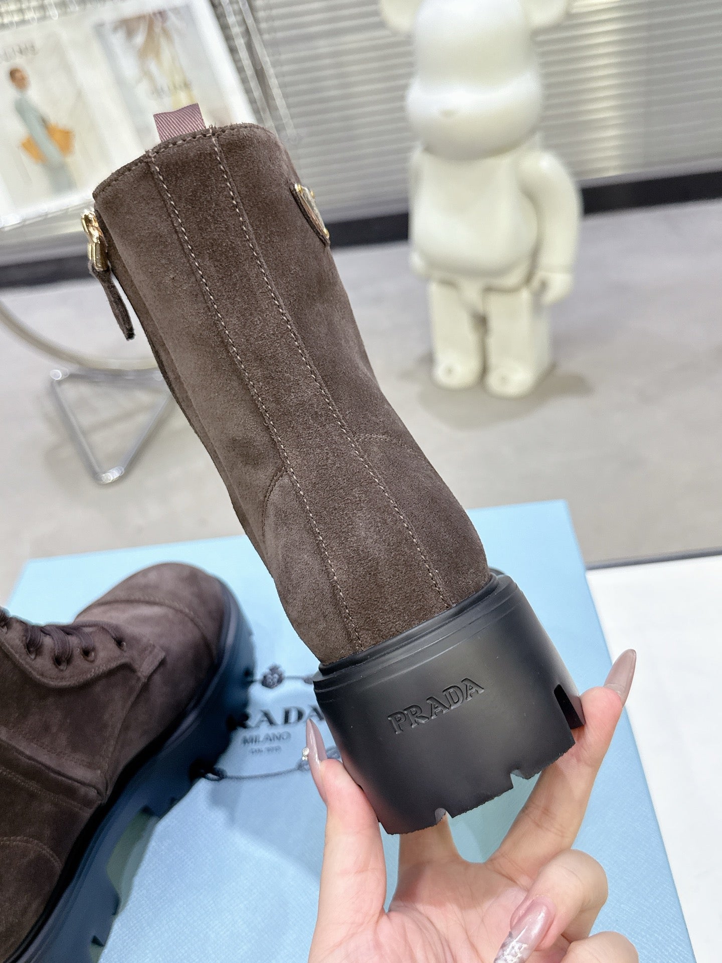 PRADA 25S WARRIOR BOOTS IN DARK BROWN SUEDE