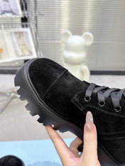 PRADA 25S WARRIOR BOOTS IN BLACK SUEDE