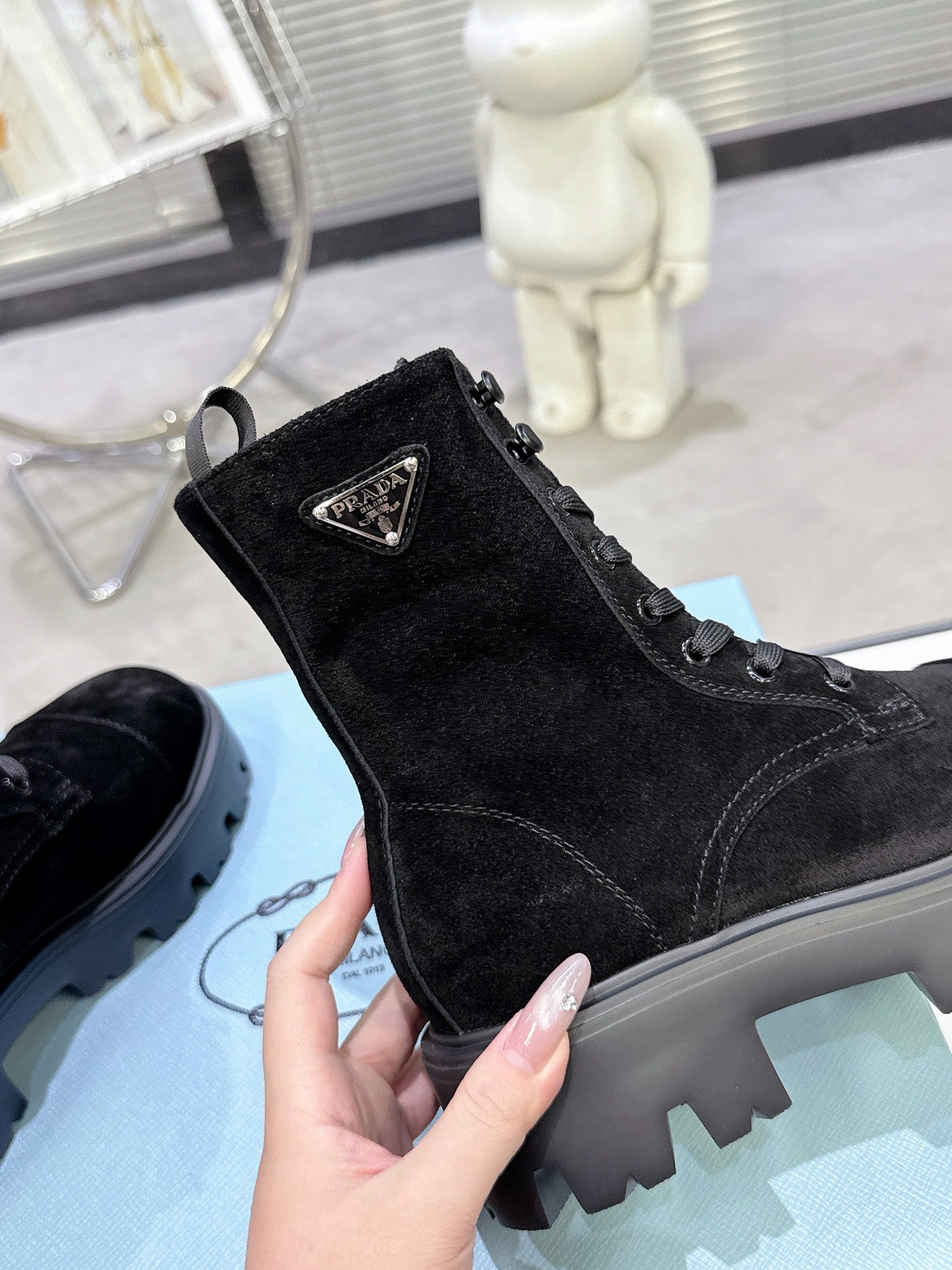 PRADA 25S WARRIOR BOOTS IN BLACK SUEDE