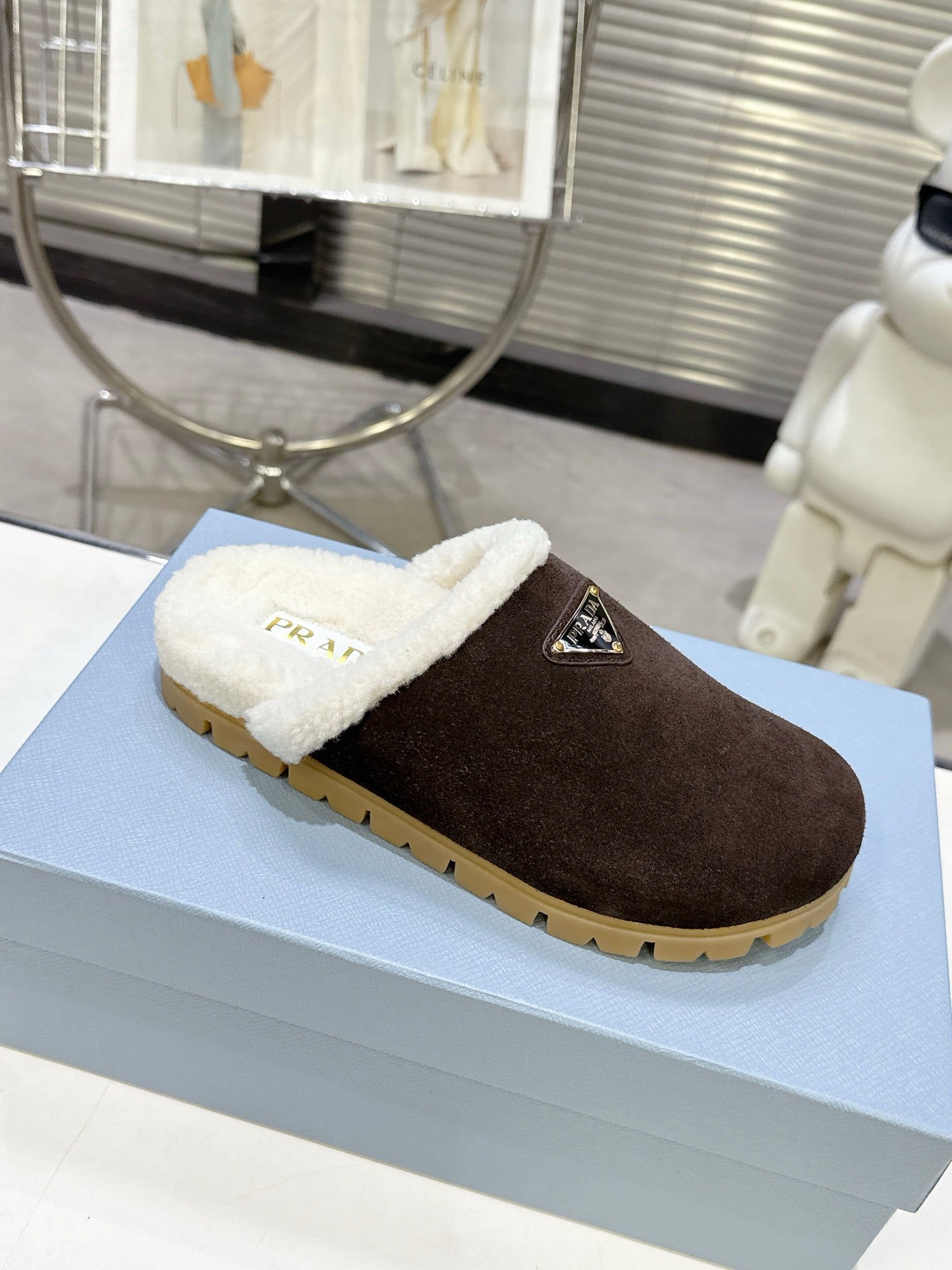 PRADA 25S FUR-LINED MULES IN DARK BROWN SUEDE