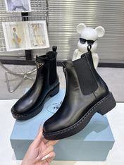 PRADA 25S RETRO PLATFORM MARTIN BOOTS IN BLACK CALFSKIN