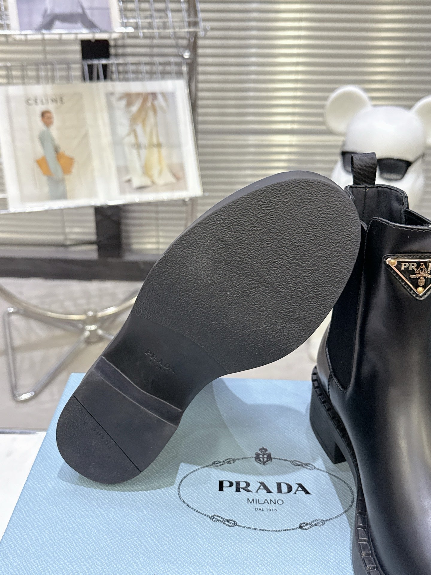 PRADA 25S RETRO PLATFORM MARTIN BOOTS IN BLACK CALFSKIN