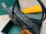 SAINT MARTIN BAG 34 IN BLACK GOYARDINE CANVAS AND CALFSKIN