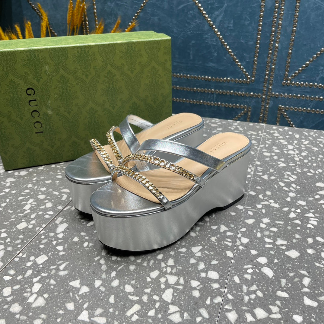 HIGH WEDGE PLATFORM IN SILVER CALFSKIN WITH GOLD HARDWARE