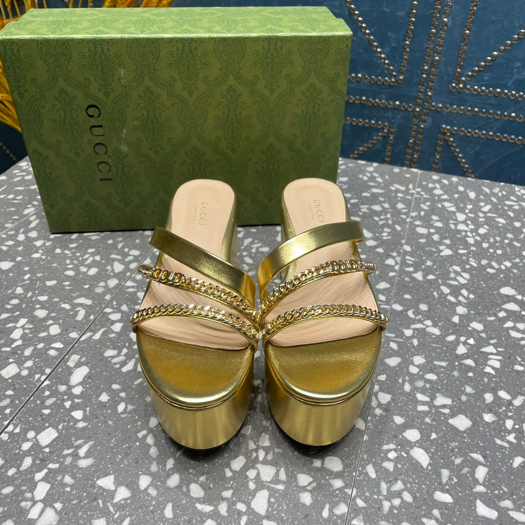 HIGH WEDGE PLATFORM IN GOLD CALFSKIN WITH GOLD HARDWARE
