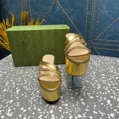 HIGH WEDGE PLATFORM IN GOLD CALFSKIN WITH GOLD HARDWARE