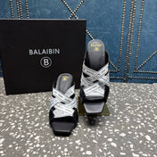 BALMAIN 26S HIGH-HEEL SANDALS 95 MM IN BLACK CALFSKIN AND WHITE FABRIC