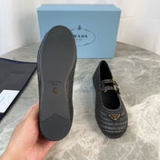 PRADA 25S BALLET FLAT IN BLACK RAFFIA AND CALFSKIN