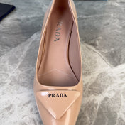 PRADA 25S POINTED-TOE HIGH HEELS 55 MM IN WARM BEIGE LAMBSKIN