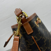 CLARA BAG 19 IN BLACK TRIOMPHE CANVAS AND BROWN CALFSKIN TRIM