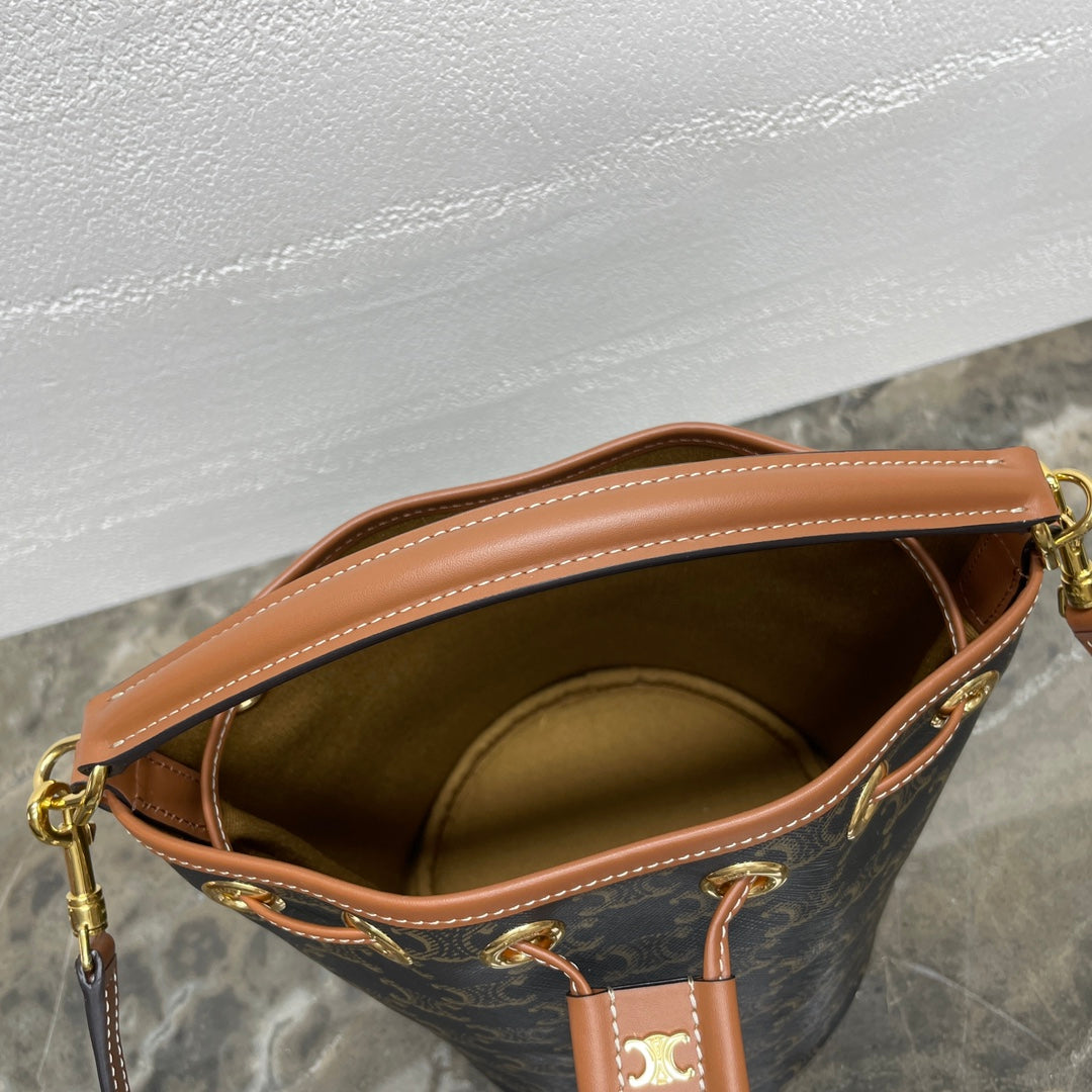 CLARA BAG 19 IN BLACK TRIOMPHE CANVAS AND BROWN CALFSKIN TRIM