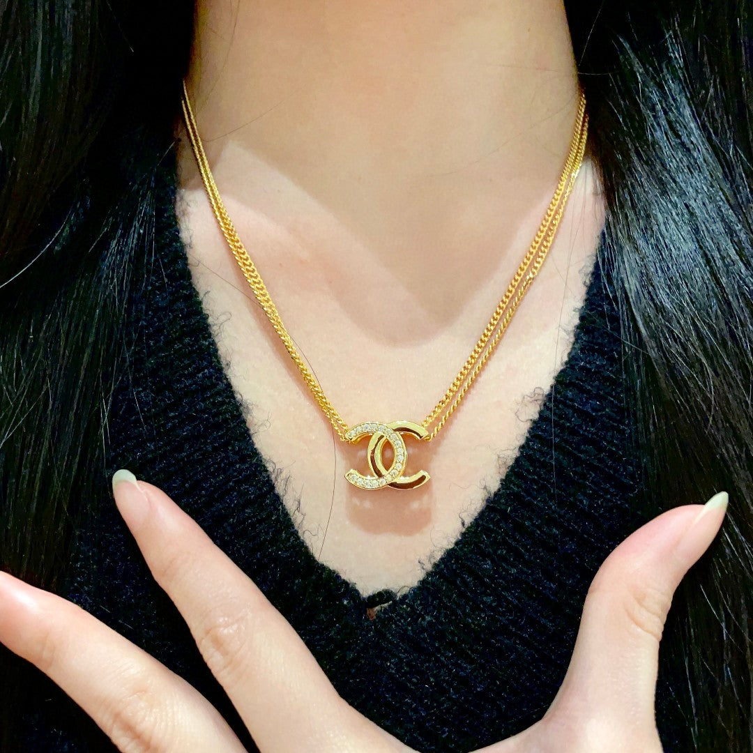 DOUBLE C HEART NECKLACE IN GOLD METAL