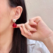 CHANEL 26S DOUBLE C LOGO PEARL STUD EARRINGS WITH RED GLASS DROP IN GOLD METAL 629893