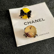 CHANEL 26S DOUBLE C LOGO BLACK BOW YELLOW ENAMEL ROUND STUD EARRINGS IN GOLD METAL 631024