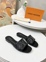 FLAT SLIDE IN BLACK LAMBSKIN WITH RHINSTONES