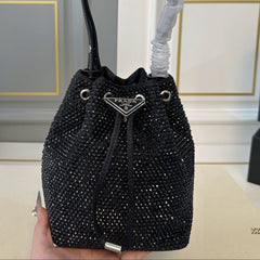 STUDDED BUCKET BAG 19 IN BLACK RE-NYLON MIX CALFSKIN