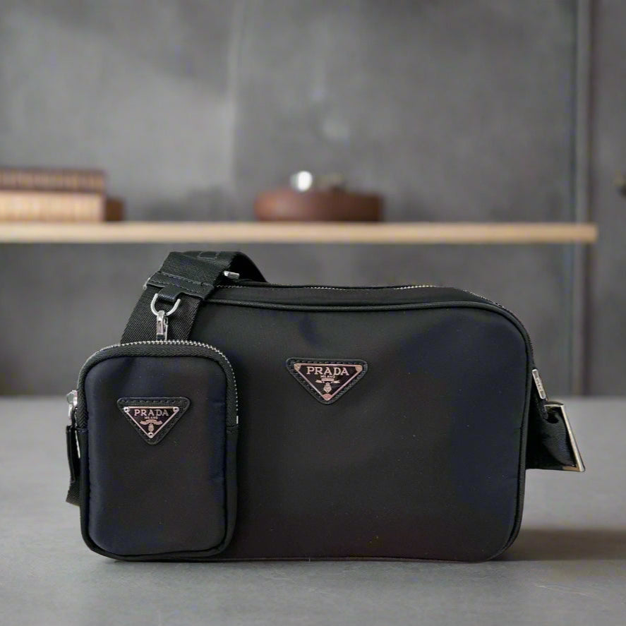 TRIANGLE LOGO CROSSBODY BAG 25 IN BLACK RE-NYLON
