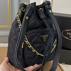 DRAWSTRING BUCKET BAG 23 IN BLACK QUILTED RE-NYLON