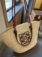 LOE SMALL ANAGRAM BASKET 28 BAG IN NATURAL MIX BROWN IRACA PALM AND CALFSKIN
