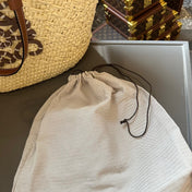 LOE SMALL ANAGRAM BASKET 28 BAG IN NATURAL MIX BROWN IRACA PALM AND CALFSKIN