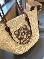 LOE SMALL ANAGRAM BASKET 28 BAG IN NATURAL MIX BROWN IRACA PALM AND CALFSKIN