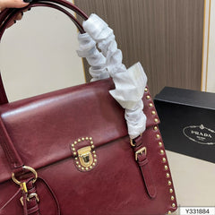 STUDDED TOP HANDLE BAG 33 IN BURGUNDY RED SMOOTH CALFSKIN