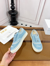 DIOR 26S LOW TOP SNEAKERS IN LIGHT BLUE CANVAS WITH WHITE LACE TRIM & LOGO PRINT