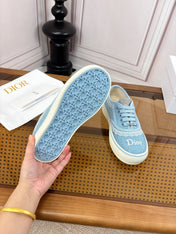 DIOR 26S LOW TOP SNEAKERS IN LIGHT BLUE CANVAS WITH WHITE LACE TRIM & LOGO PRINT