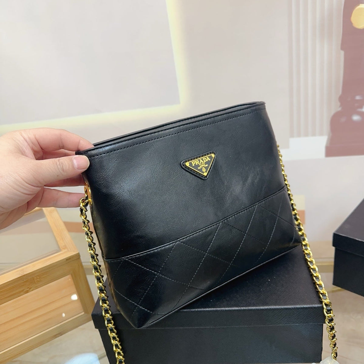 QUILTED CHAIN MINI HOBO BAG 19 IN SHINY BLACK CALFSKIN