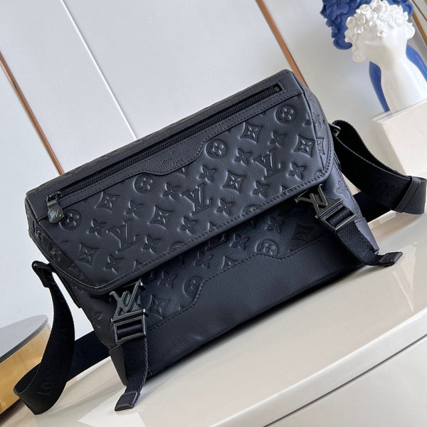 MESSENGER VOYAGER PM 33 IN BLACK MONOGRAM SHADOW CALFSKIN