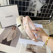 HEADBAND EMBELLISHED FLOWER AND PEARL IN LIGHT PINK SILK 194315