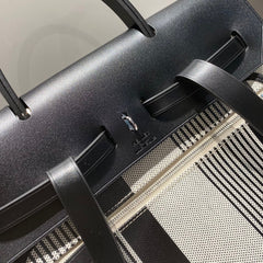 HERBAG A DOS ZIP RETOURNE BACKPACK 29 IN OFF-WHITE MIX BLACK CANVAS AND CALFSKIN