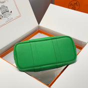 GARDEN PARTY 30CM IN CADMIUM GREEN TOILETS COTTON CANVAS AND GREEN CALFSKIN