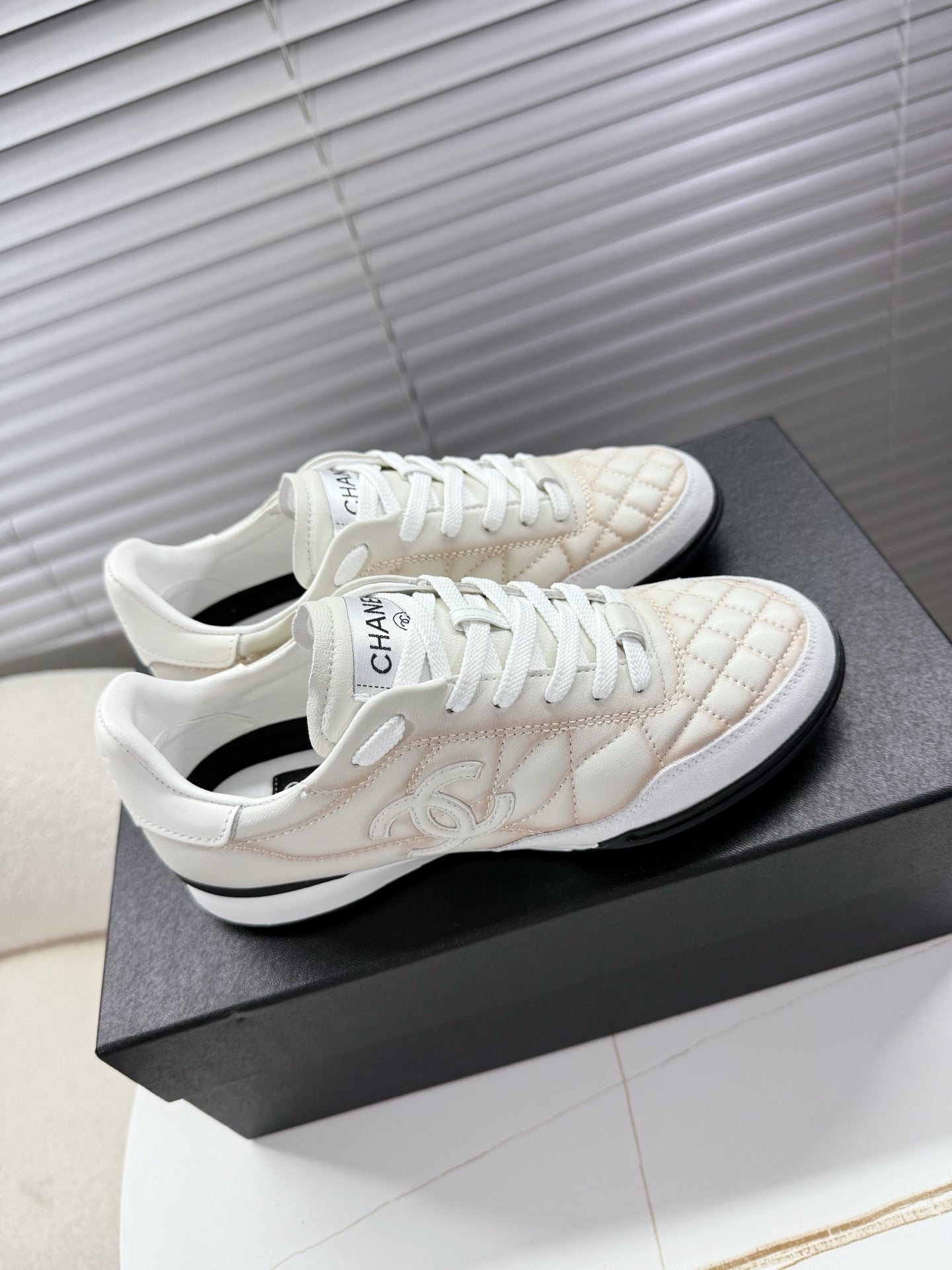 CHANEL 25S TRAINERS WHITE AND LIGHT CORAL IN CALFSKIN