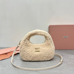 WANDER HOBO BAG 18 IN BEIGE SHEARLING