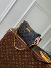 LIV POCHETTE BAG 24 IN BLACK MONOGRAM EMPREINTE LEATHER