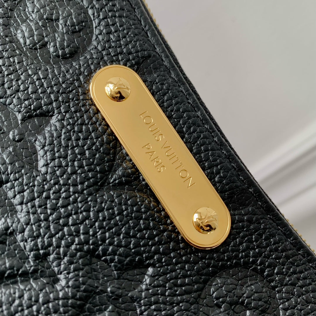 LIV POCHETTE BAG 24 IN BLACK MONOGRAM EMPREINTE LEATHER