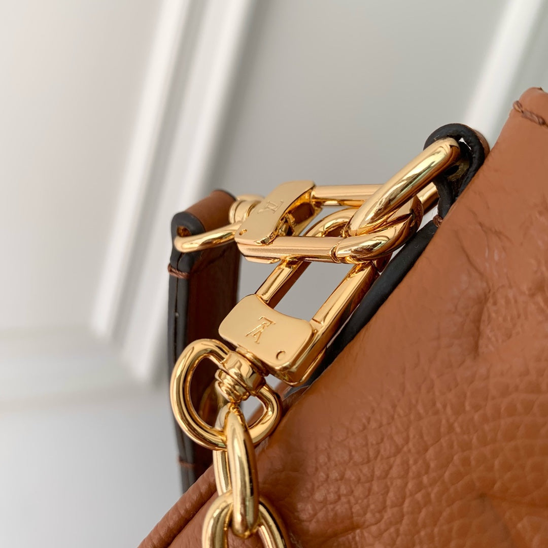 LIV POCHETTE BAG 24 IN COGNAC BROWN MONOGRAM EMPREINTE LEATHER