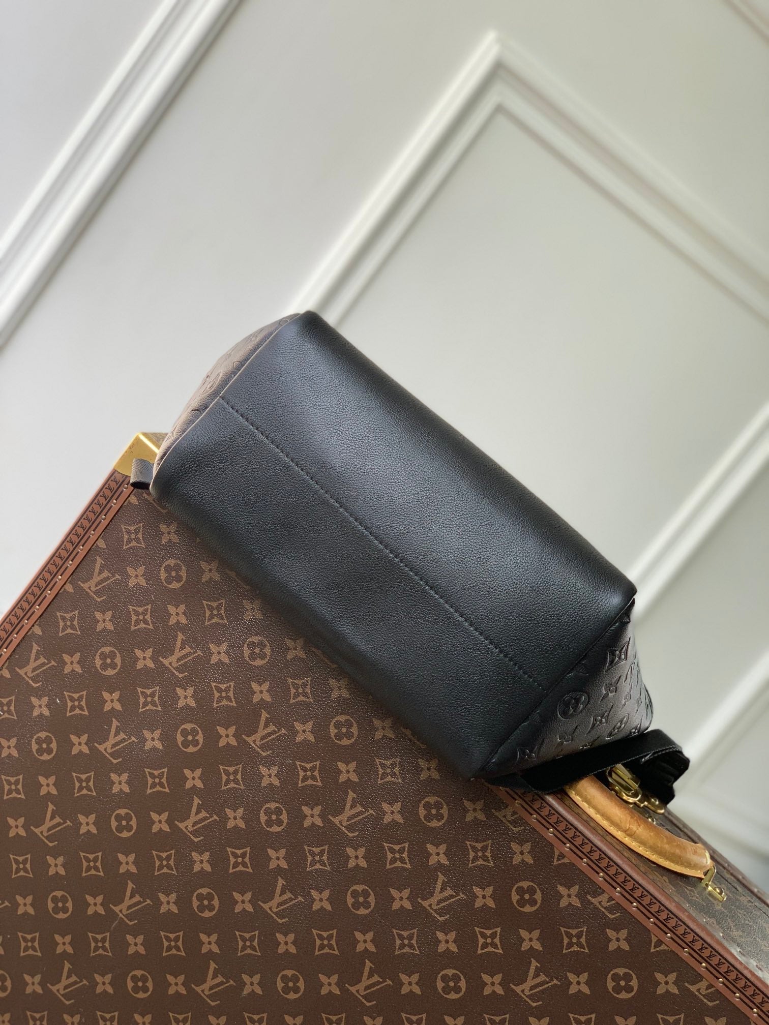 GETAWAY BACKPACK 50 IN BLACK MONOGRAM ECLIPSE CANVAS AND CALFSKIN EMBOSSED LOGO