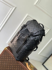 GETAWAY BACKPACK 50 IN BLACK MONOGRAM ECLIPSE CANVAS AND CALFSKIN EMBOSSED LOGO
