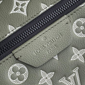 DISCOVERY PM BACKPACK 38 IN OLIVE GREEN MONOGRAM LAMBSKIN