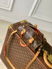 NANO SPEEDY DATING 18 IN BROWN COATED CANVAS GOLD HARDWARE