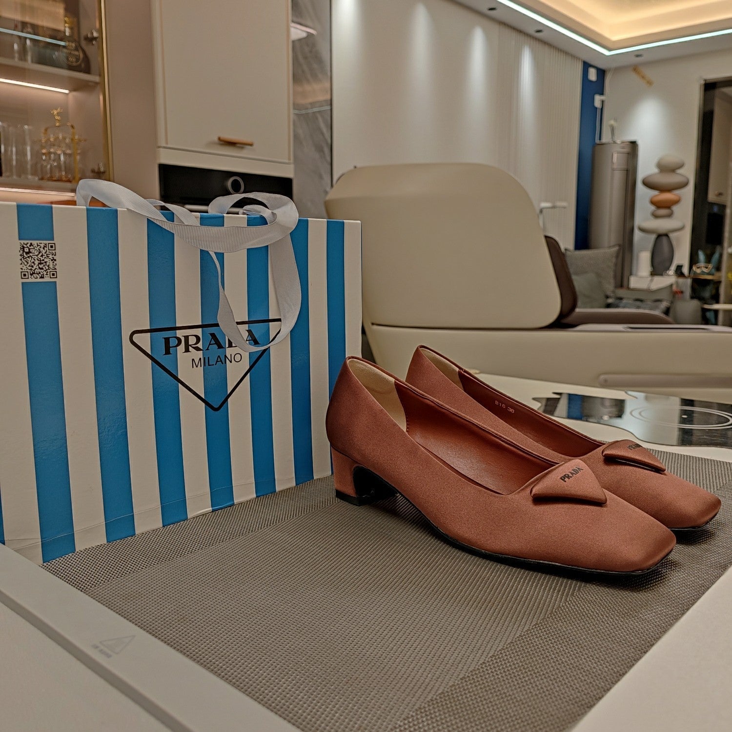 TRIANGLE LOGO PUMPS IN CHESTNUT BROWN SATIN