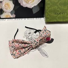 HAIRBAND IN LIGHT PINK FLORAL FABRIC 385853