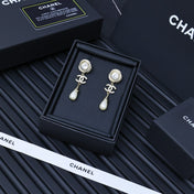 25S TWISTED RIBBED DOUBLE C IN GOLD METAL LONG PEARL PENDANT EARRINGS