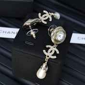 25S TWISTED RIBBED DOUBLE C IN GOLD METAL LONG PEARL PENDANT EARRINGS