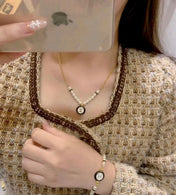 CLASSIC CC PEARL CHAIN NECKLACE WITH IMITATION PEARLS BLACK RESIN