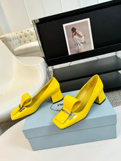 SQUARE TOE PUMPS IN YELLOW GLOSSY CALFSKIN ATTACHED BOW