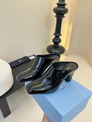 HIGH HEEL MULES WITH GOLD LETTERING LOGO IN BLACK GLOSSY CALFSKIN