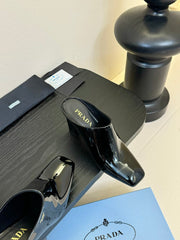 HIGH HEEL MULES WITH GOLD LETTERING LOGO IN BLACK GLOSSY CALFSKIN